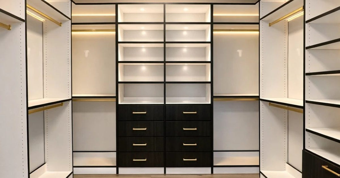 Spacious custom walk-in closet with a center island, double-hang rods, drawers, and shoe shelving
