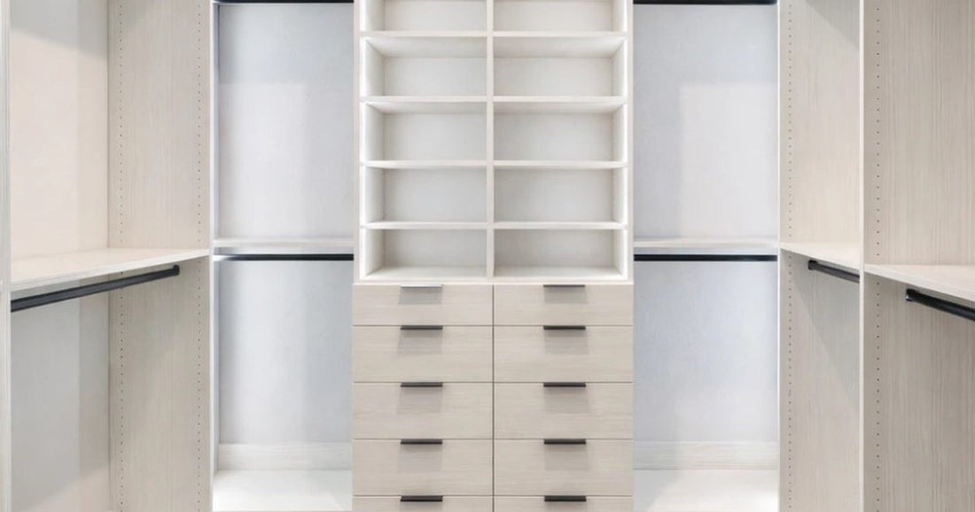 Bright custom walk-in closet with white melamine shelving, hanging rods, and a center island in an Orlando home