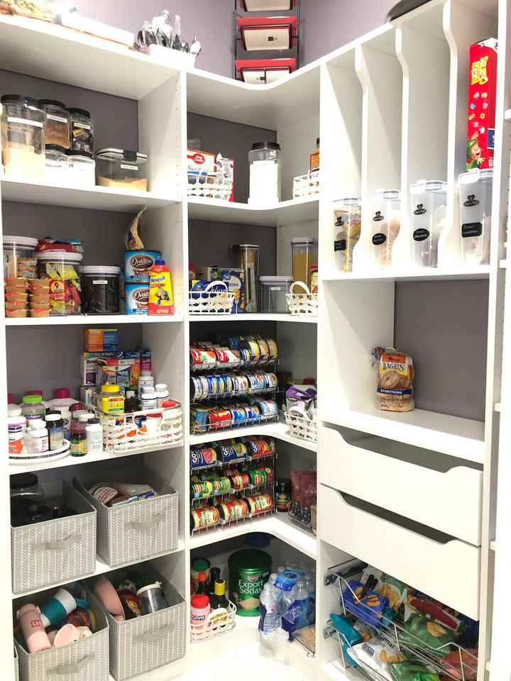 Walk-in pantry with adjustable shelves, pull-out drawers and bins